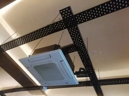 Ceiling cassette unit being installed
