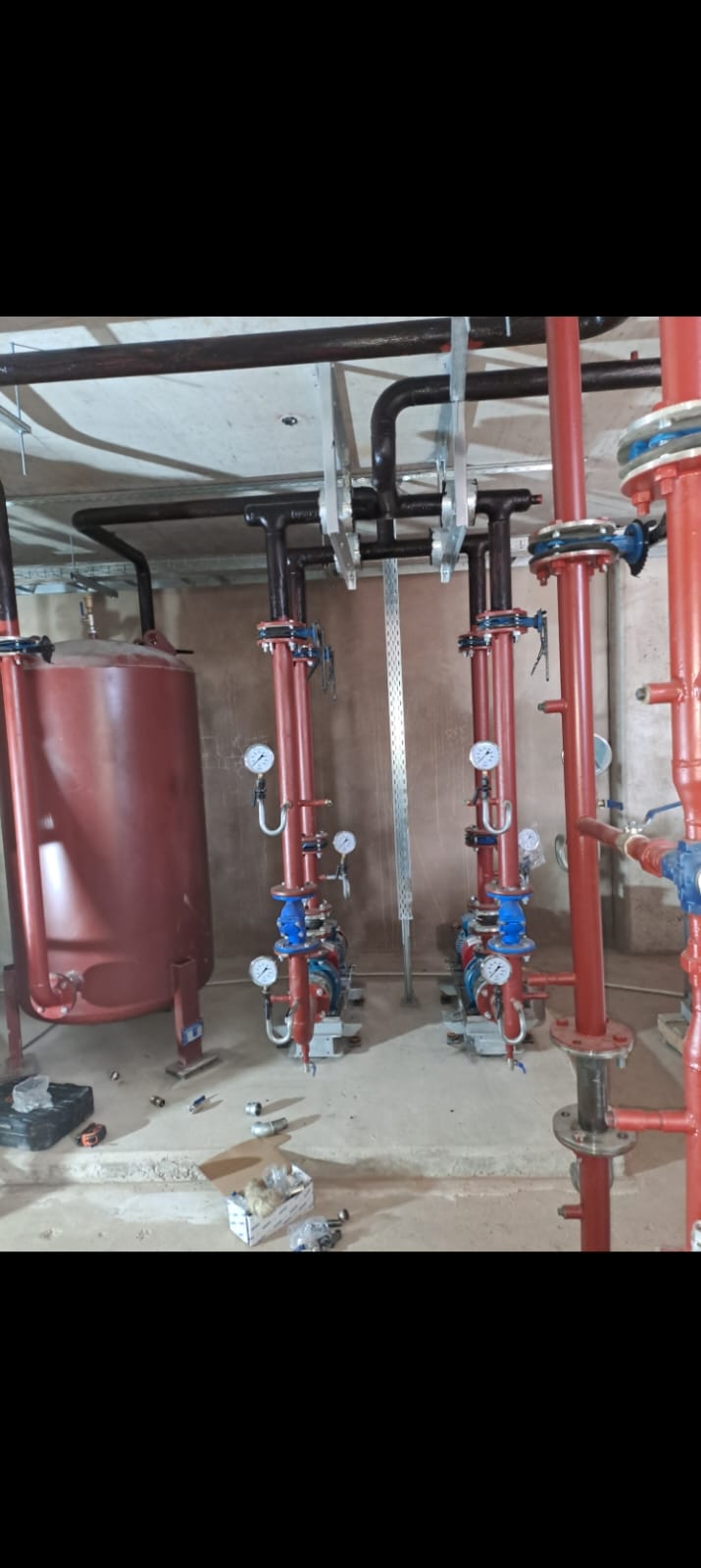Red chilled water piping with pumps
