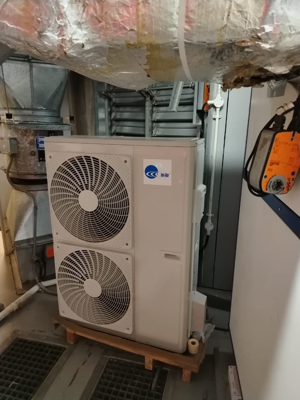 Jet-Air unit in commercial plant room with ducting